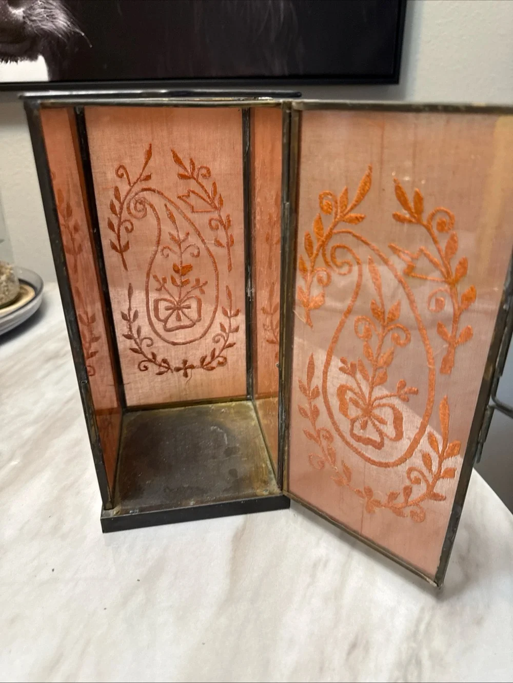 Square lantern paper thin stitching inside glass